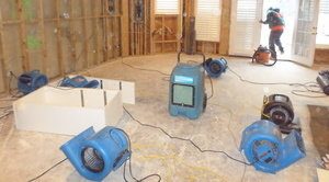 Air Movers Drying Out Room After A Flood